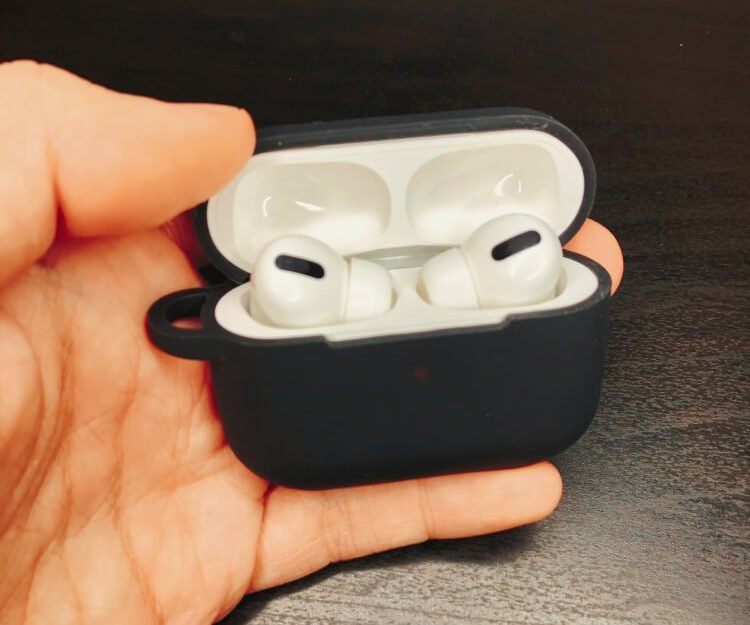 AirPods Pro in a silicone case with the lid open showing the AirPods