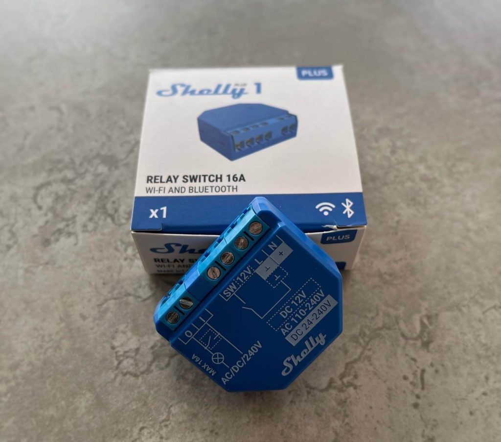 Shelly Plus 1 device outside of its packaging
