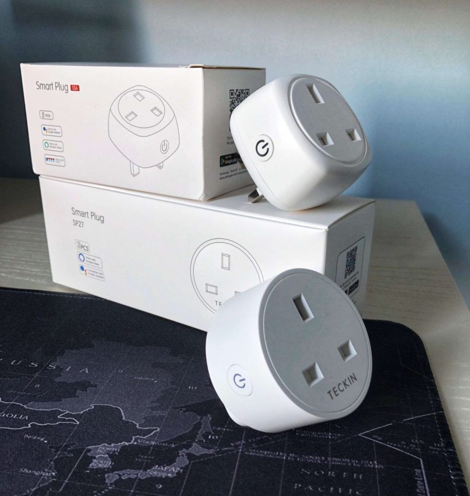 Teckin smart plugs next to their packaging